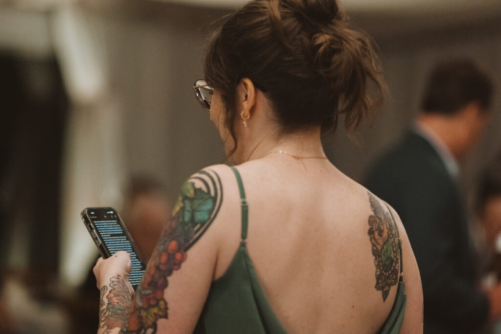 A girl gives a speech that is written on her phone